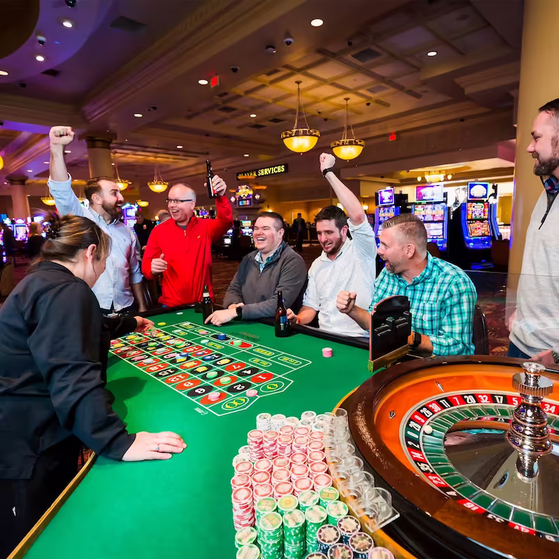 A group enjoying the roulette table