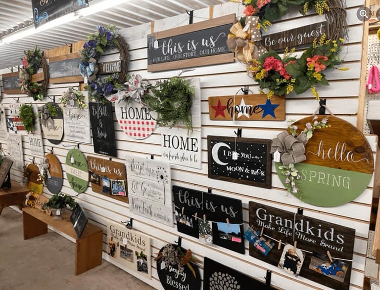 Signs for sale at Finders Keepers Vendor Mall