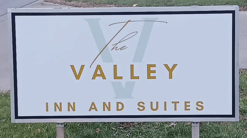 Sign for Valley Inn and Suites